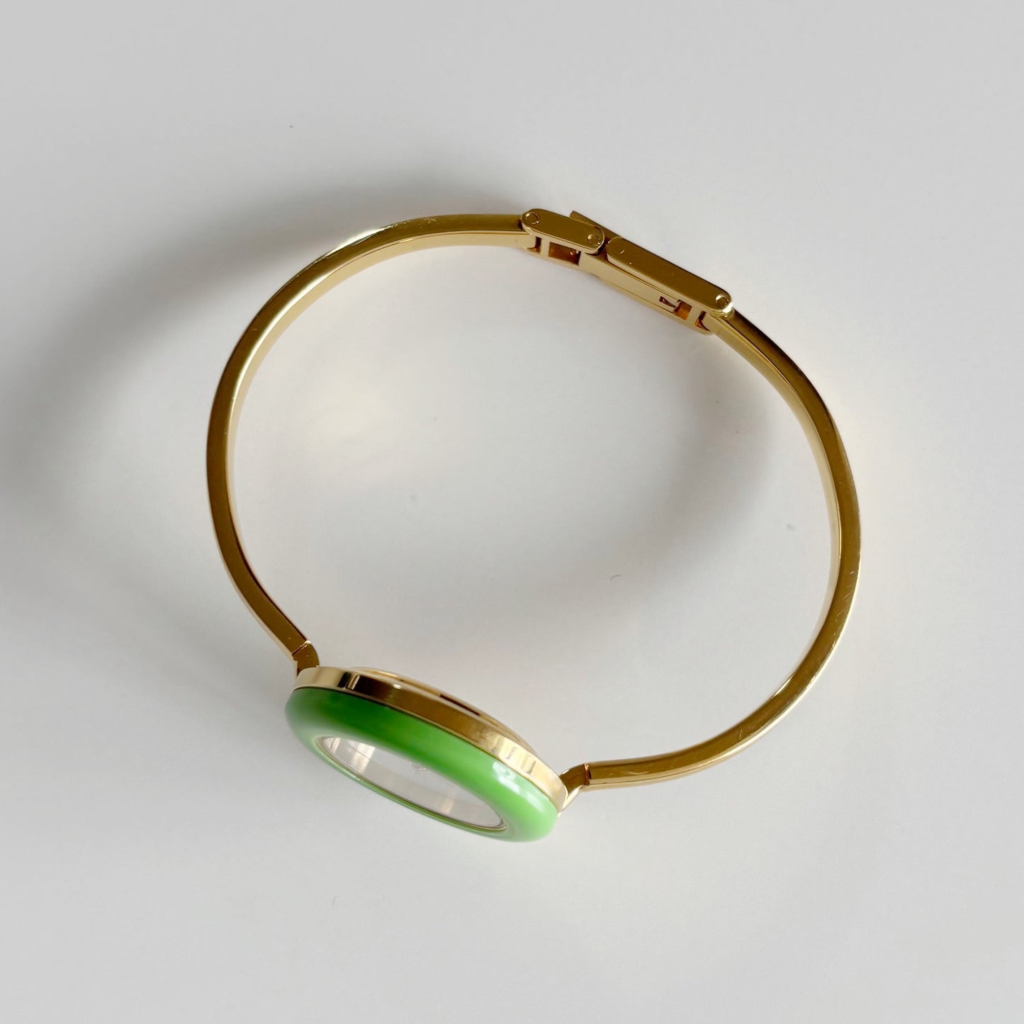Gucci 1990sInterchangeable Bezel Gold Plated Bangle Watch with 12 bezels, case