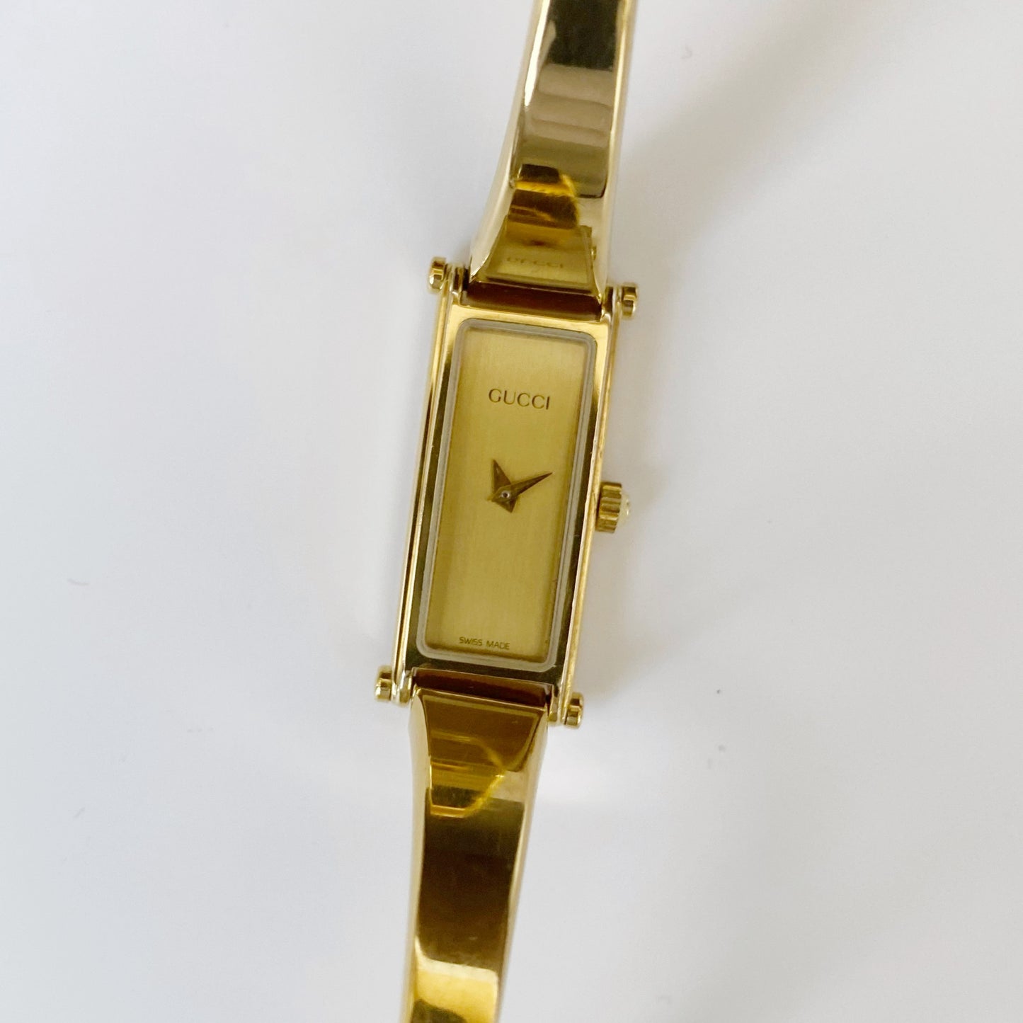 Gucci 1990s Rectangular Gold Plated Bangle Watch