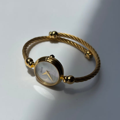 Gucci 1990s Seashell Round Dial Gold-Plated Cable Bangle Watch