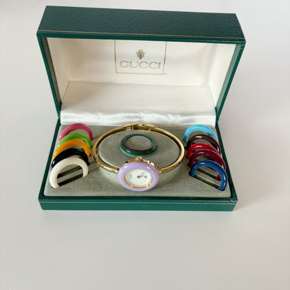 Gucci 1990s Interchangeable Bezel Gold Plated Bangle Watch with 12 bezels, case
