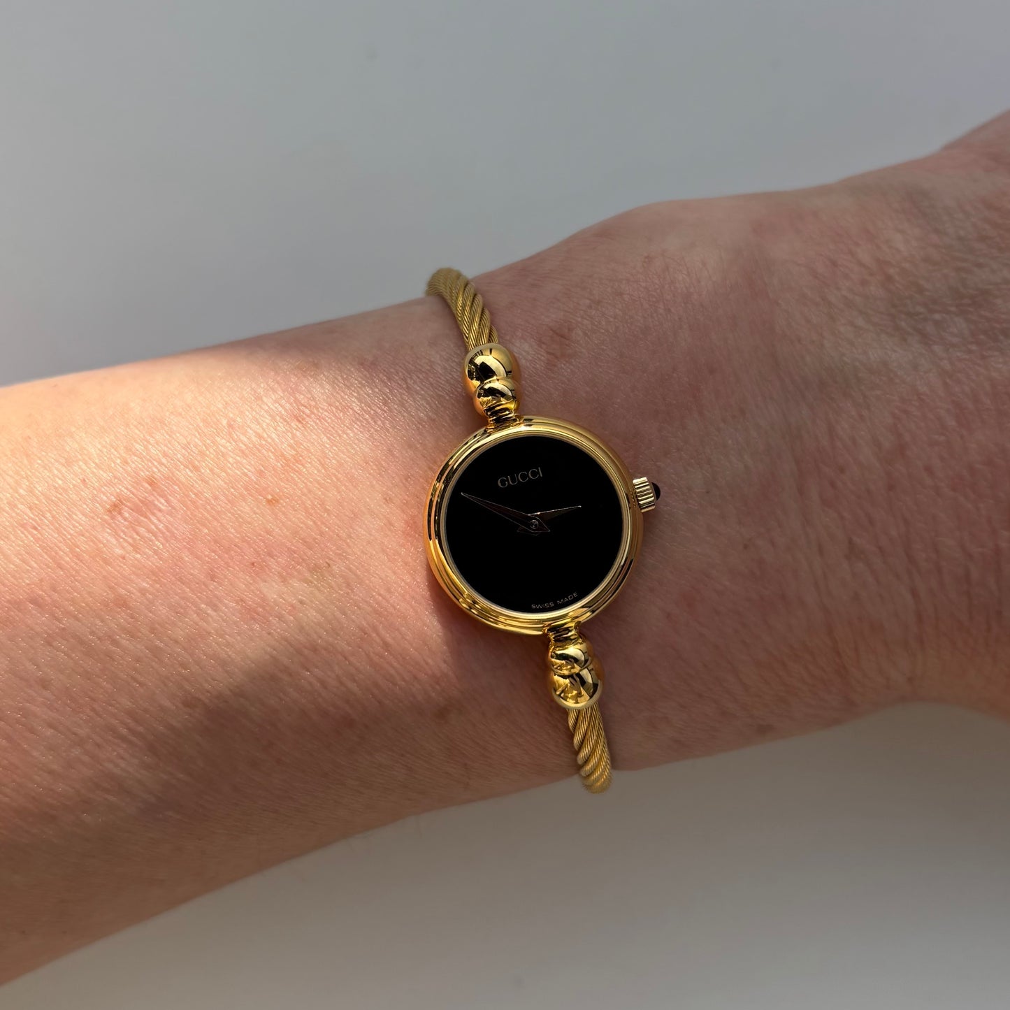 Gucci 1990s Black Dial Gold Plated Cable Band Bangle Watch