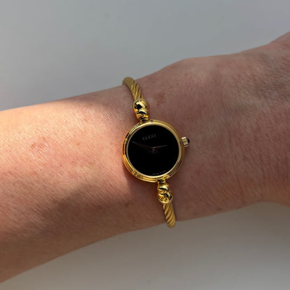Gucci 1990s Black Dial Gold Plated Cable Band Bangle Watch