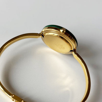 Gucci 1990s Interchangeable Bezel Gold Plated Bangle Watch with 12 bezels, case