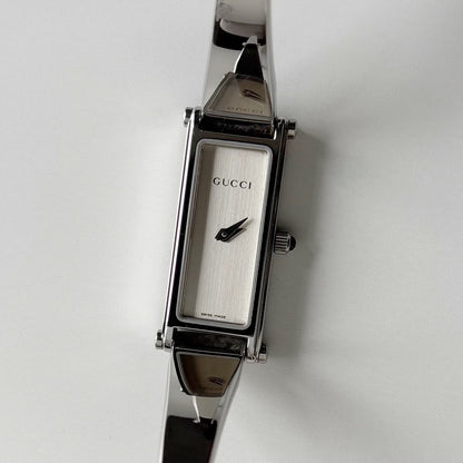 Gucci 1990s Rectangular Dial Silver Bangle Watch