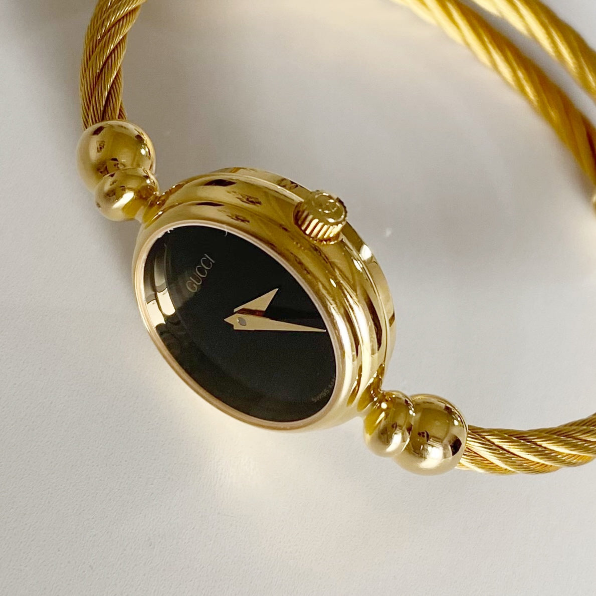 Gucci 1990s Black Dial Gold Plated Cable Bangle Watch