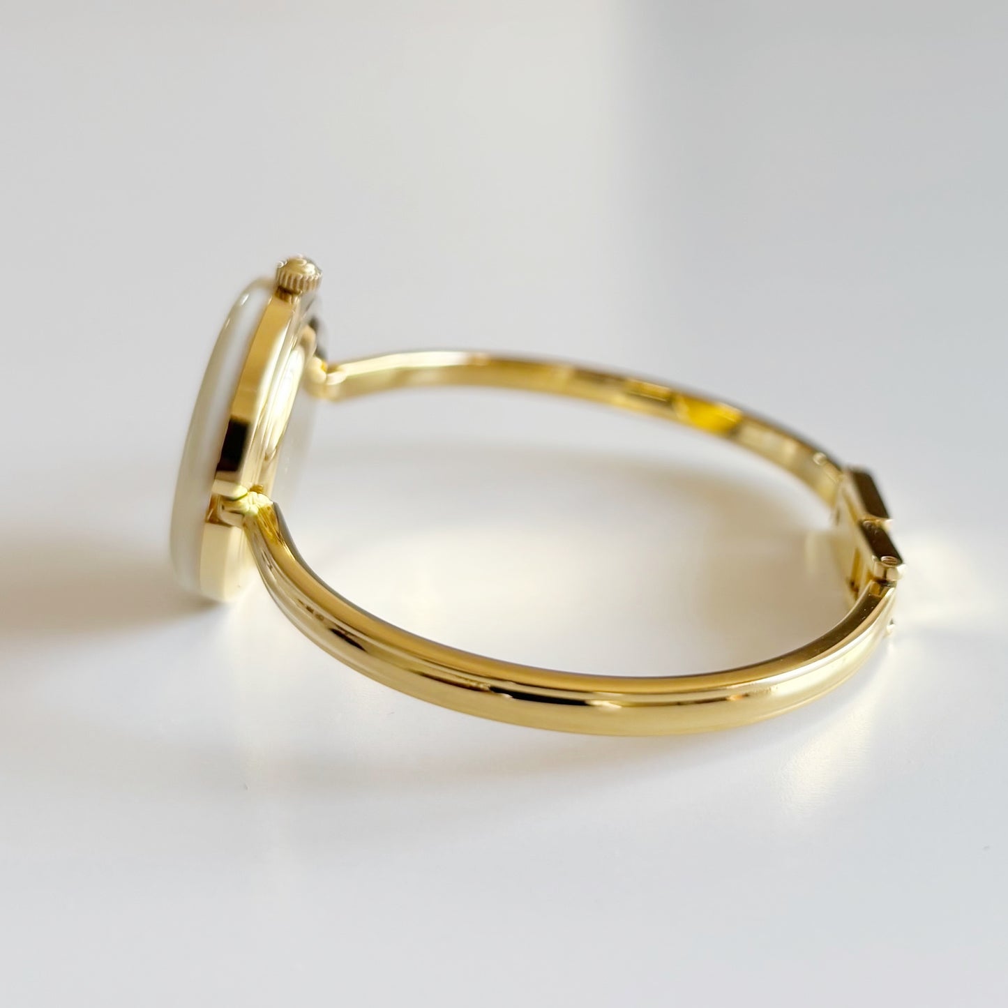 Gucci 1990s Interchangeable Bezel Gold Plated Bangle Watch with 12 bezels, case