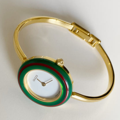 Gucci 1990s Interchangeable Bezel Gold Plated Bangle Watch with 12 bezels, case