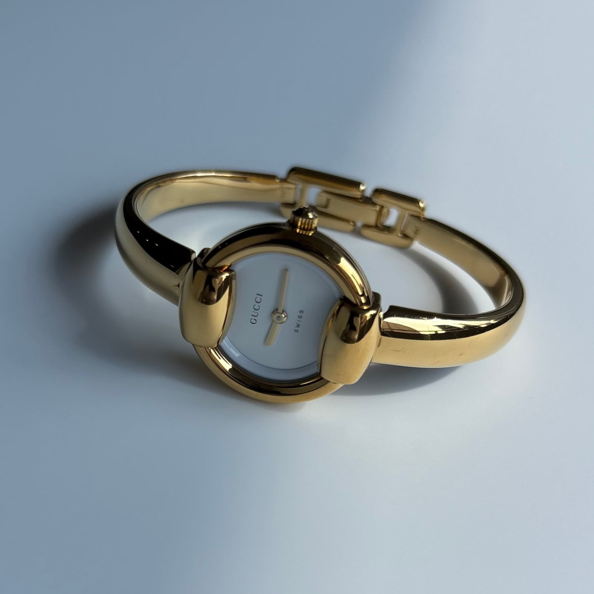 Gucci Round Dial Gold-Plated Bangle Watch