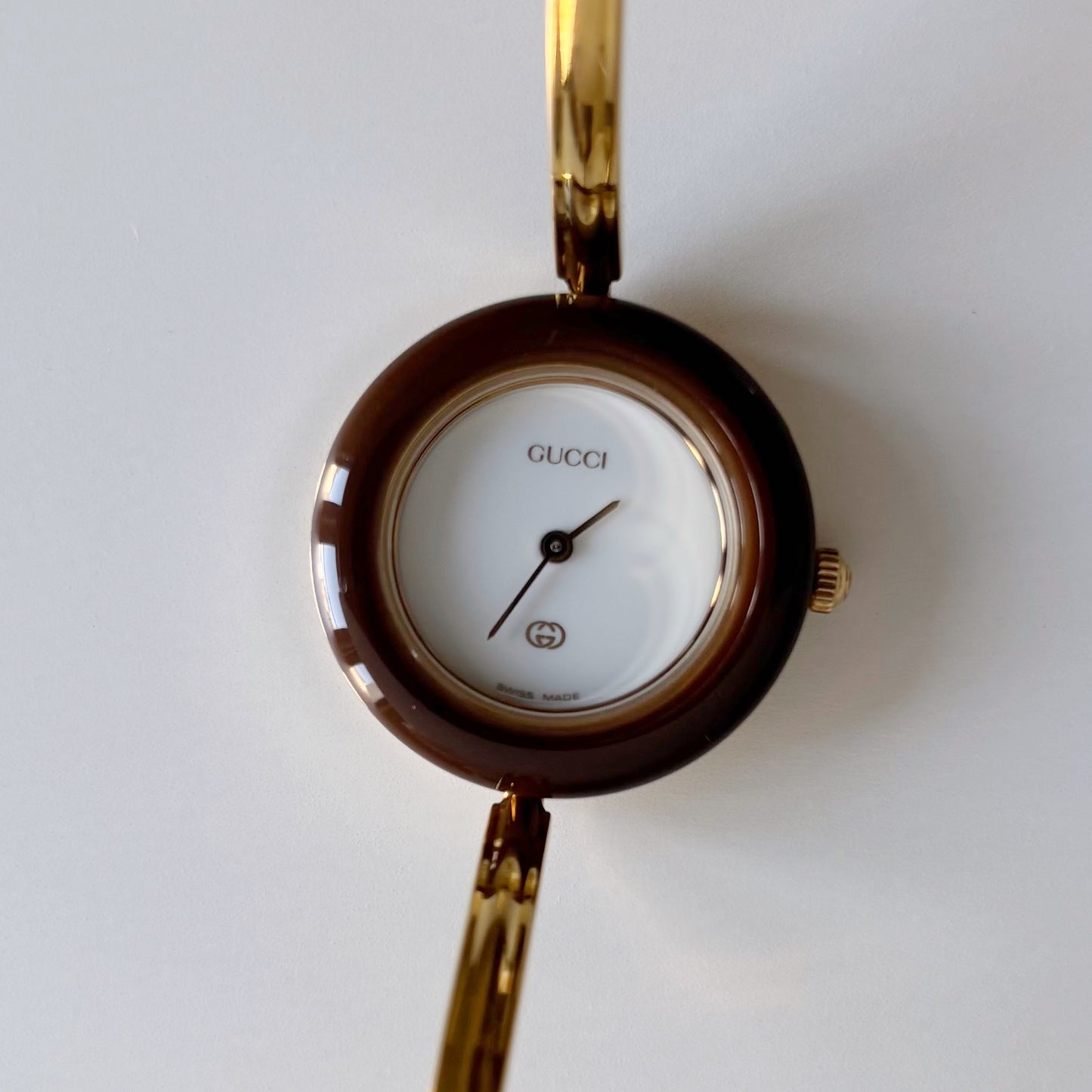 Gucci 1990s Interchangeable Bezel Gold Plated Bangle Watch with 12 bezels, case
