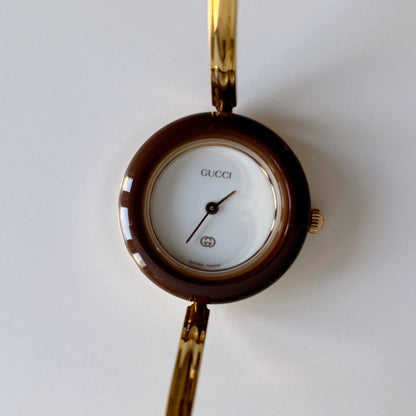 Gucci 1990s Interchangeable Bezel Gold Plated Bangle Watch with 12 bezels, case