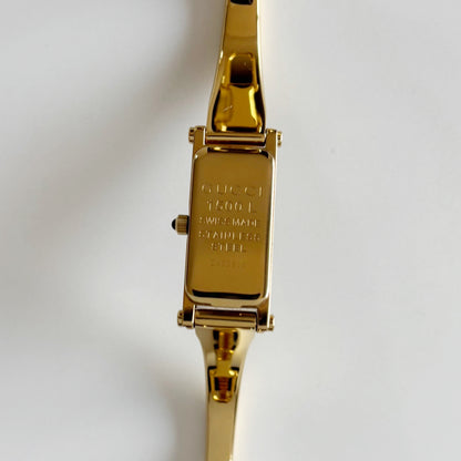 Gucci 1990s Seashell Dial Rectangular Gold Plated Bangle Watch