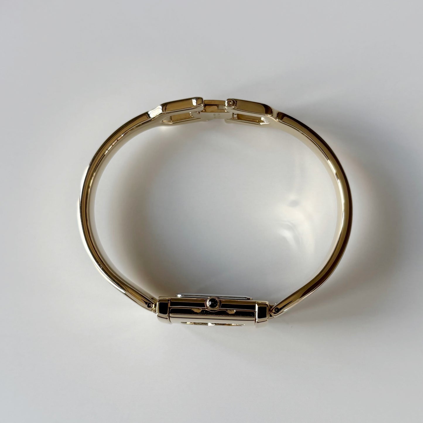 Yves Saint Laurent 1990s Peek-A-Boo Gold Plated Bangle Watch