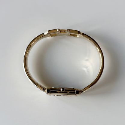 Yves Saint Laurent 1990s Peek-A-Boo Gold Plated Bangle Watch
