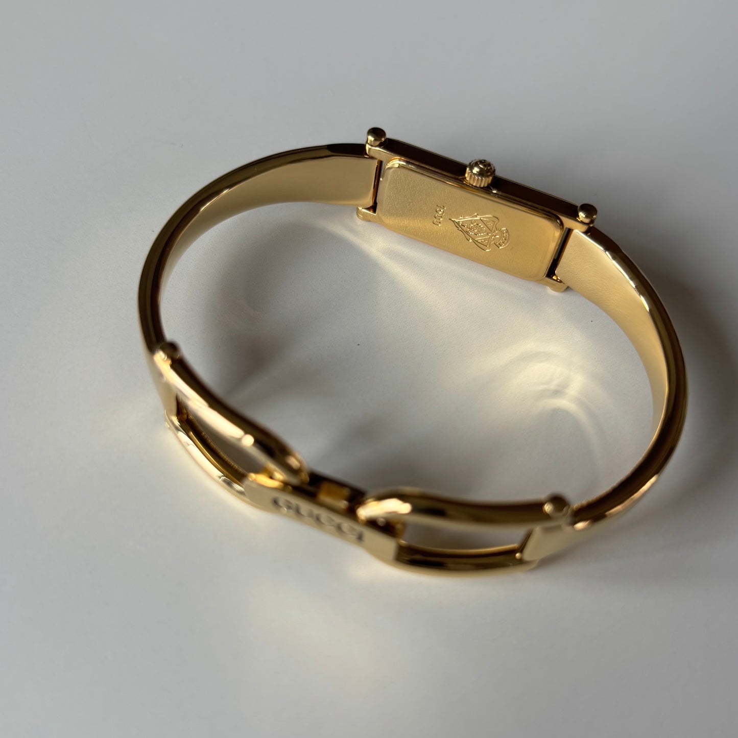 Gucci 1990s Gold Rectangular Dial Gold Plated Bangle Watch