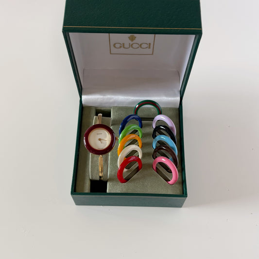 Gucci 1990s Interchangeable Bezel Gold Plated Bangle Watch with 12 bezels, case (8/30)