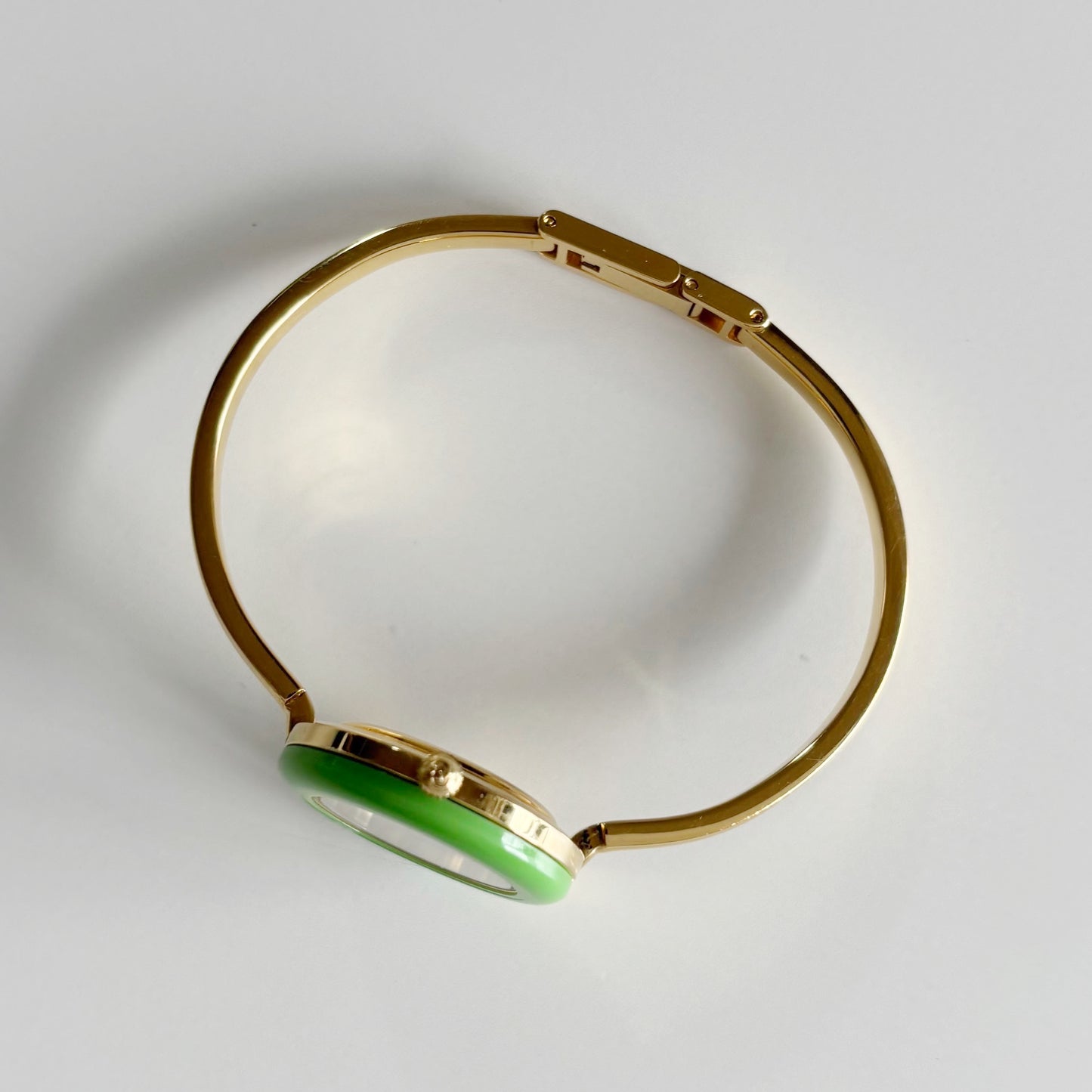 Gucci 1990sInterchangeable Bezel Gold Plated Bangle Watch with 12 bezels, case