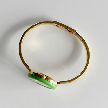 Gucci 1990sInterchangeable Bezel Gold Plated Bangle Watch with 12 bezels, case