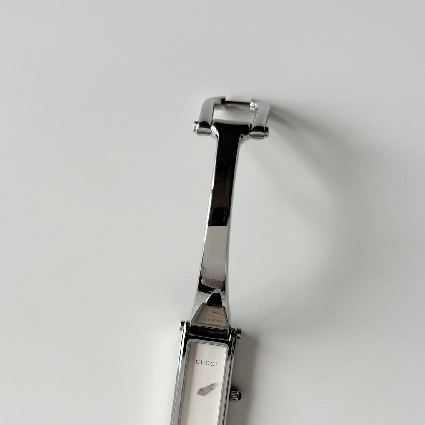 Gucci 1990s Rectangular Dial Silver Bangle Watch