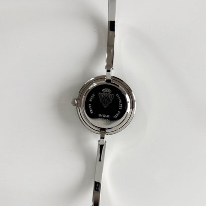 Gucci 1990s Interchangeable Bezel Stainless steel Bangle Watch with 12 bezels, case