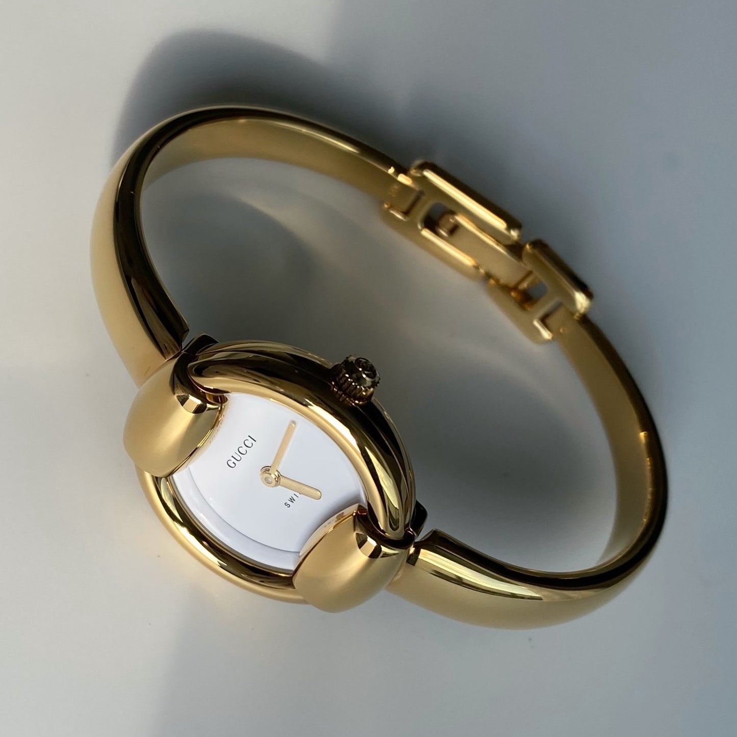 Gucci 1990s Round Dial Gold Plated Bangle Watch