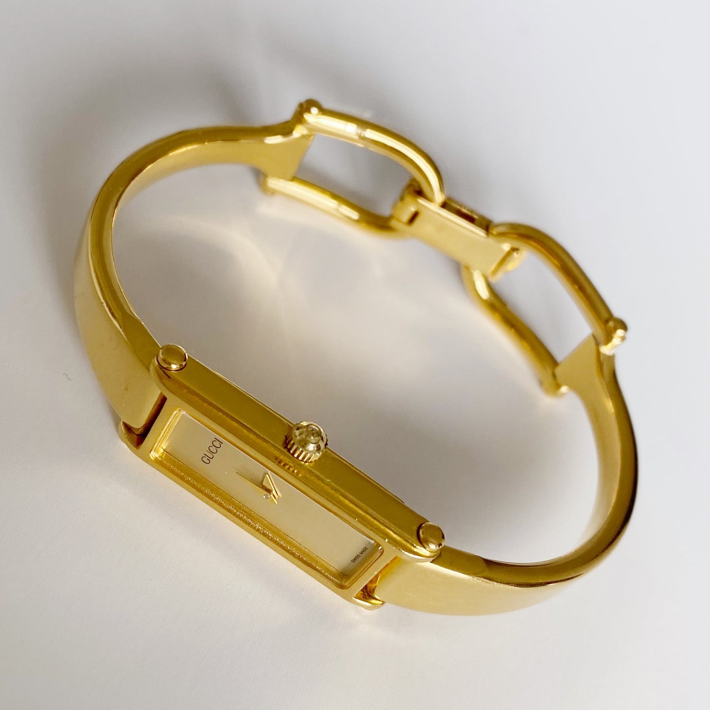 Gucci 1990s Gold Dial Rectangular  Gold Plated Bangle Watch