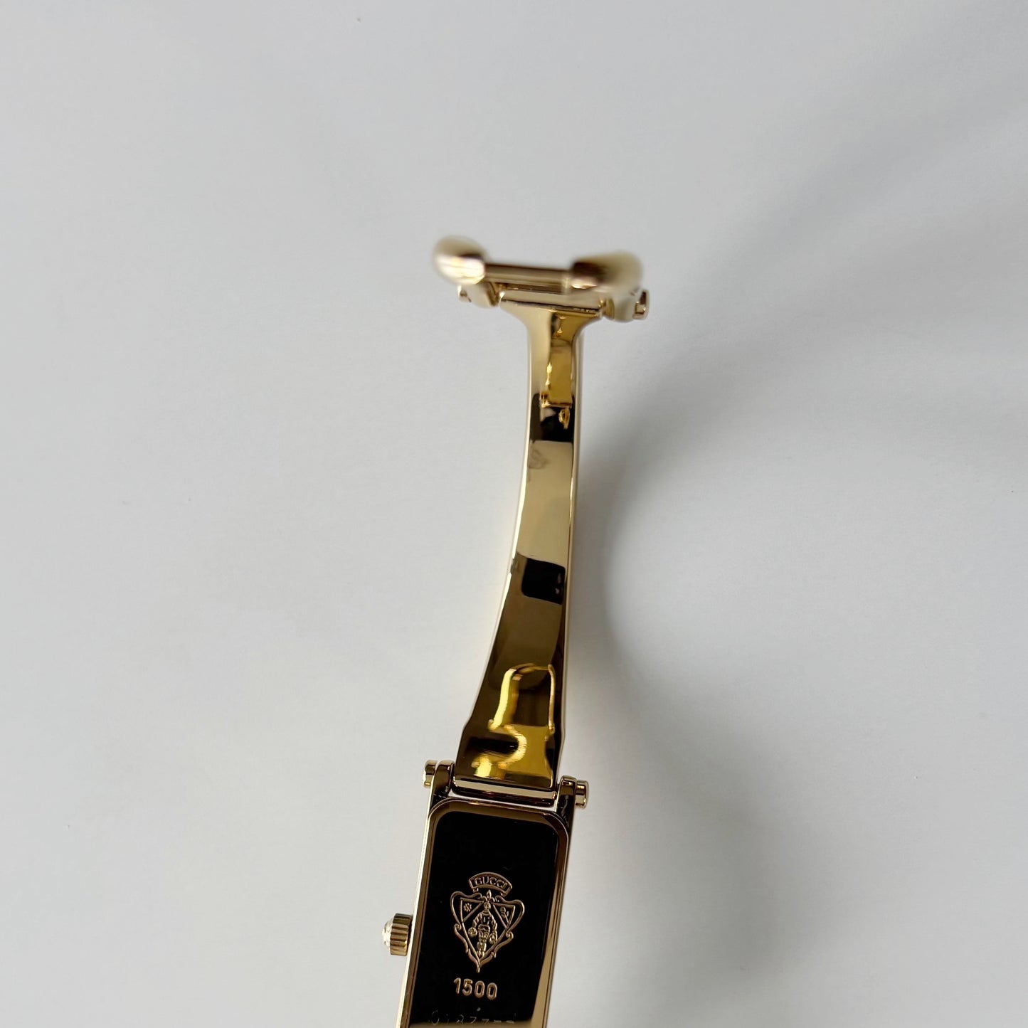 Gucci 1990s Gold Rectangular Dial Gold Plated Bangle Watch