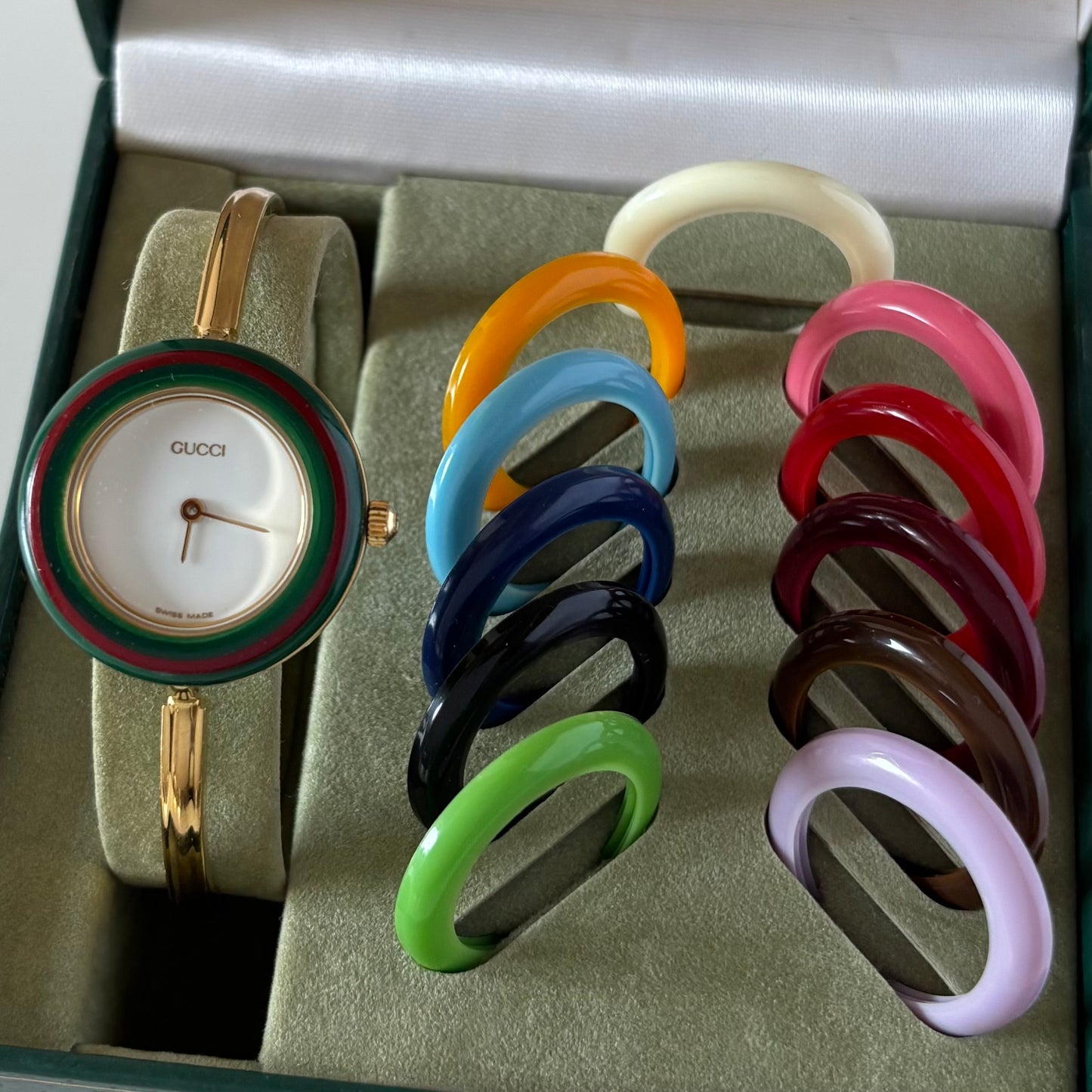 Gucci 1990s Interchangeable Bezel Gold Plated Bangle Watch with 12 bezels, case