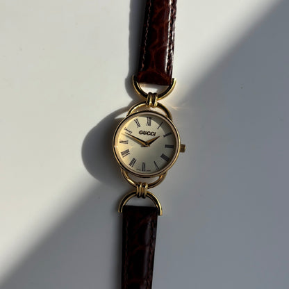 Gucci 1990s Round Dial Gold Plated Horsebit Watch