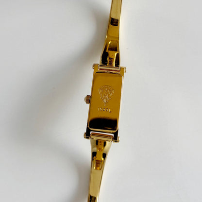 Gucci 1990s Rectangular Seashell Dial Gold Plated Bangle Watch
