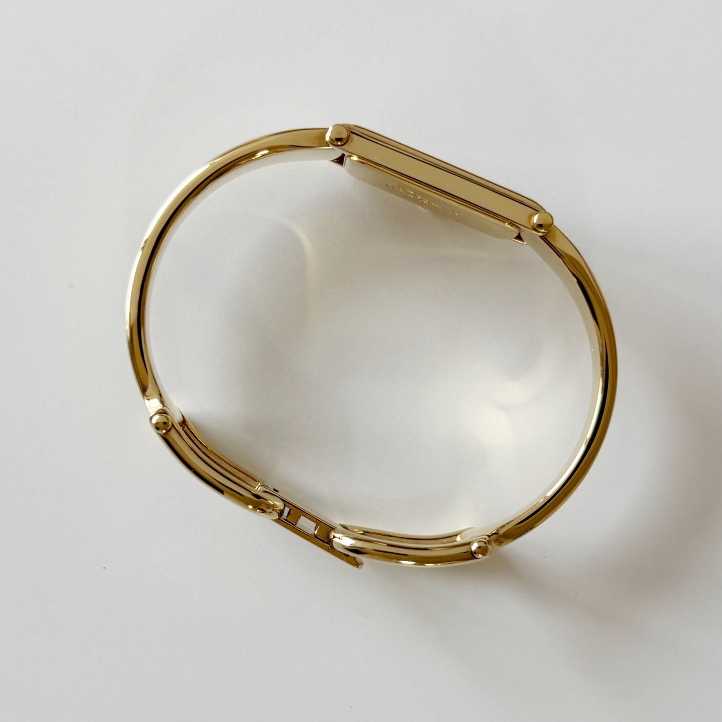 Gucci 1990s Cream Dial Rectangular Gold Plated Bangle Watch