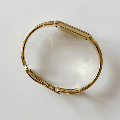 Gucci 1990s Cream Dial Rectangular Gold Plated Bangle Watch