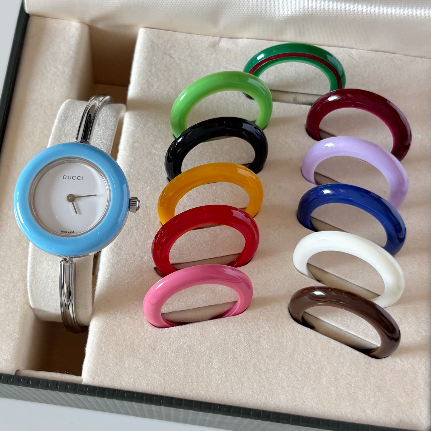 Gucci 1990s Interchangeable Bezel Silver Stainless steel Bangle Watch with 12 bezels, case