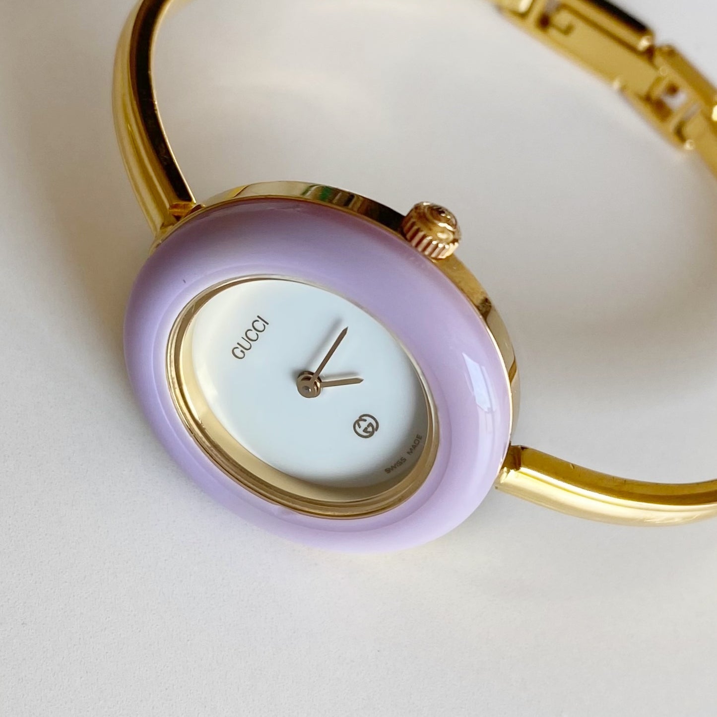 Gucci 1990s Interchangeable Bezel Gold Plated Bangle Watch with 12 bezels, case