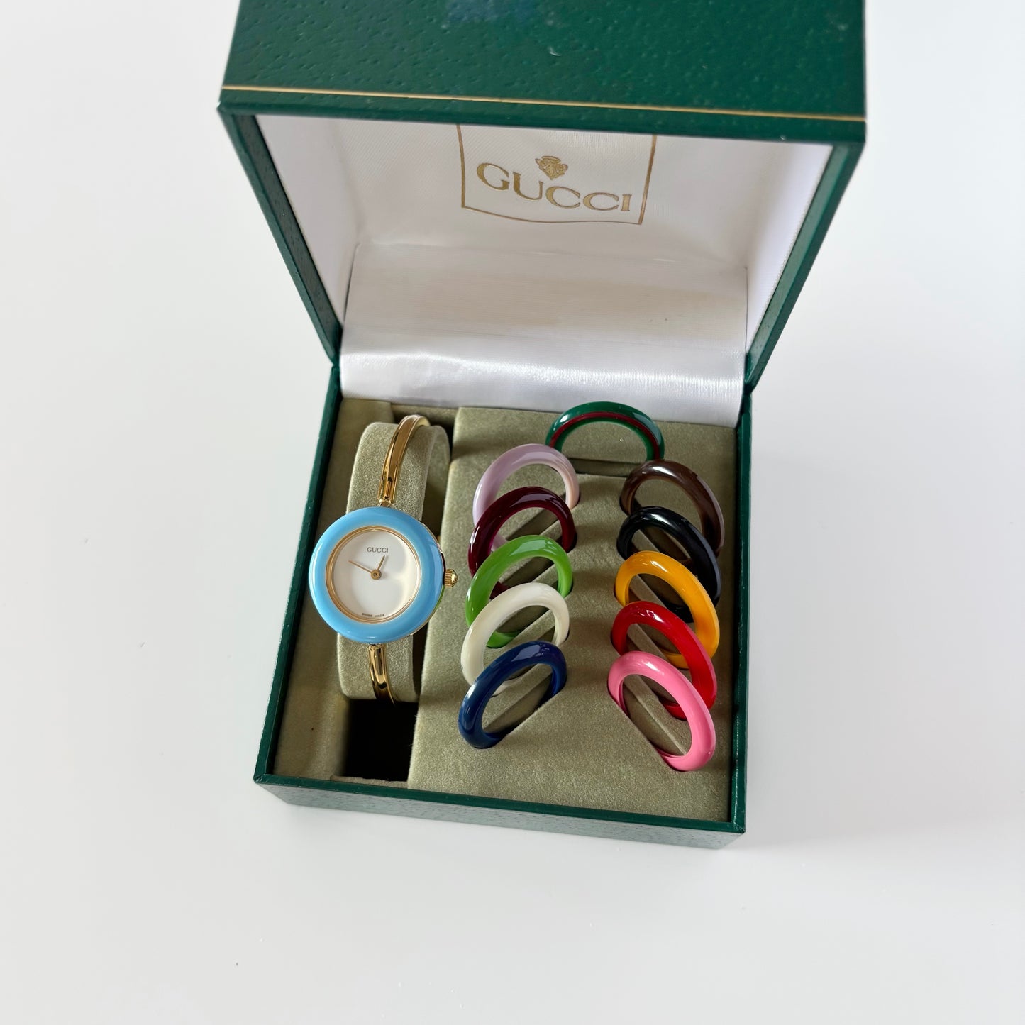 Gucci 1990s Interchangeable Bezel Gold Plated Bangle Watch with 12 bezels, case