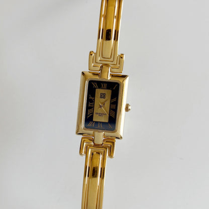 Givenchy 1990s Gold Plated Bangle Watch