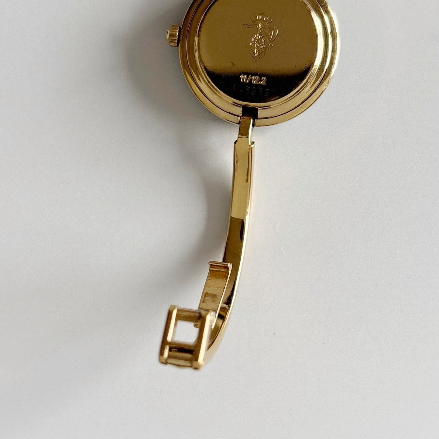 Gucci 1990s Interchangeable Bezel Gold Plated Bangle Watch with 12 bezels, case (Small)