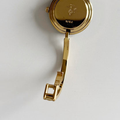 Gucci 1990s Interchangeable Bezel Gold Plated Bangle Watch with 12 bezels, case (Small)