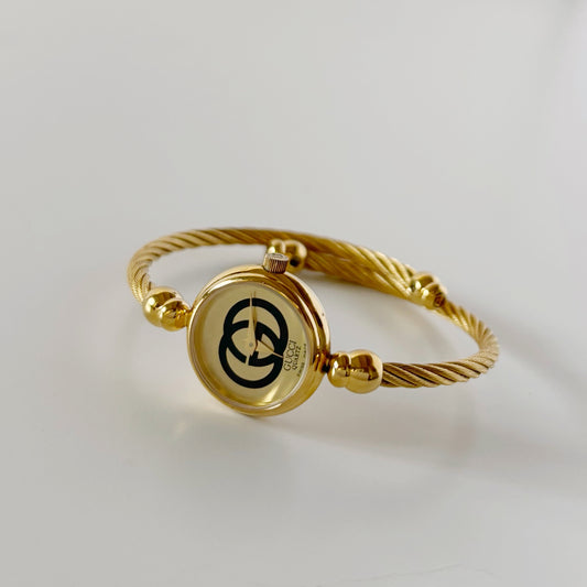 Gucci 1990s Gold Plated Cable Bangle Watch