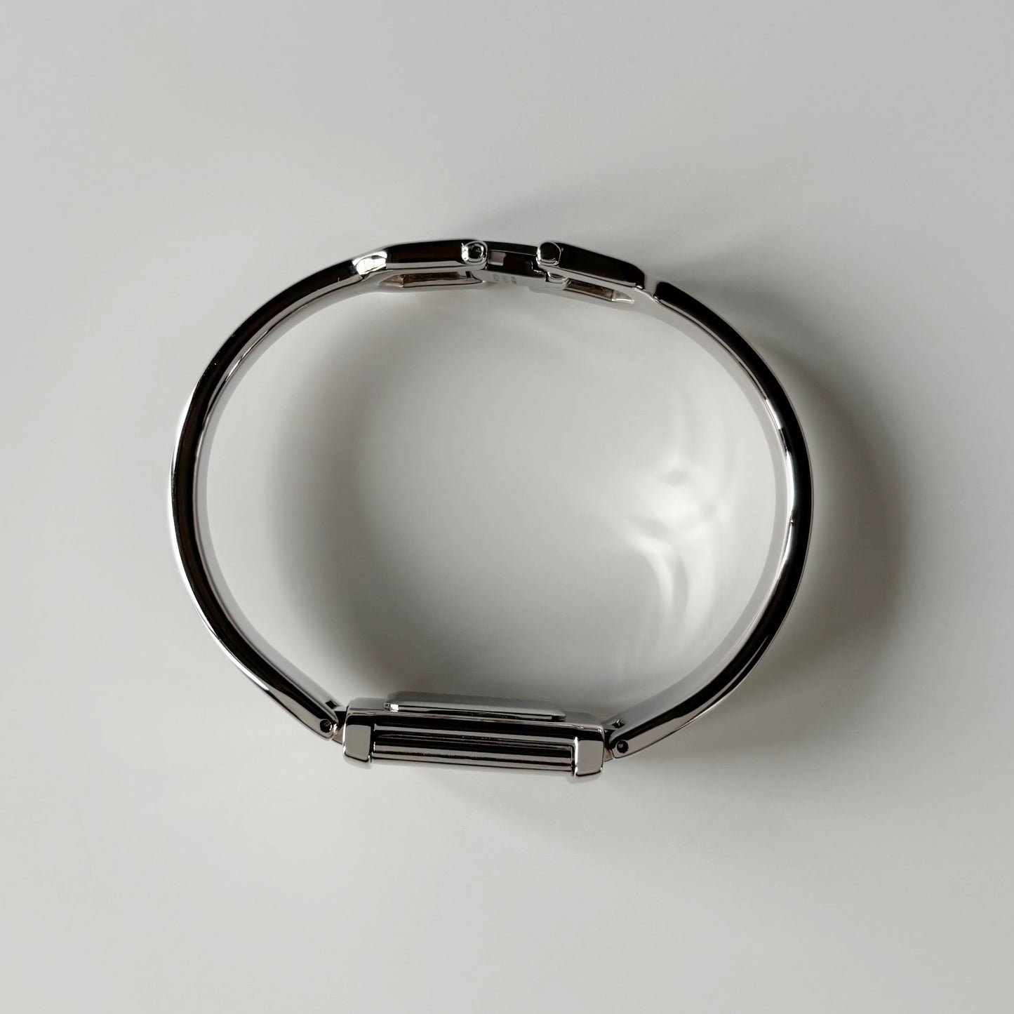 Yves Saint Laurent 1990s Black Dial Silver Bangle Watch