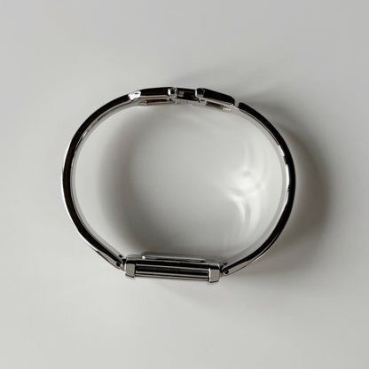 Yves Saint Laurent 1990s Black Dial Silver Bangle Watch