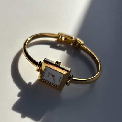 Gucci 1990s Square Dial Gold Plated Bangle Watch