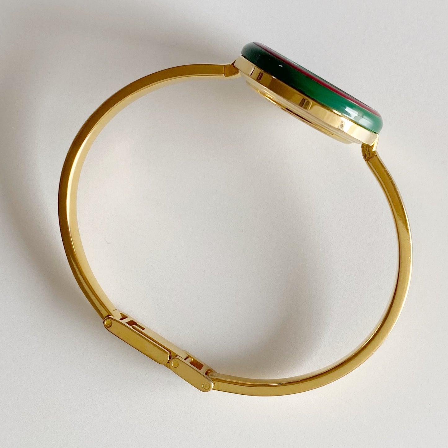 Gucci 1990s Interchangeable Bezel Gold Plated Bangle Watch with 12 bezels, case
