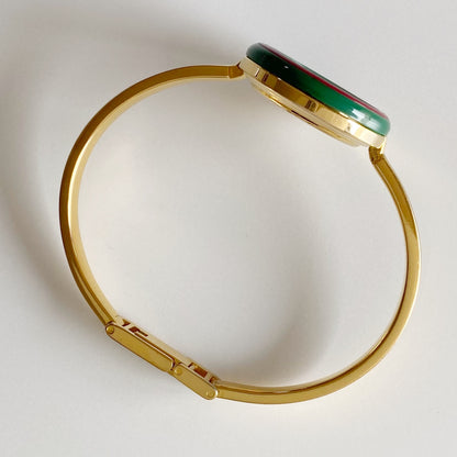 Gucci 1990s Interchangeable Bezel Gold Plated Bangle Watch with 12 bezels, case