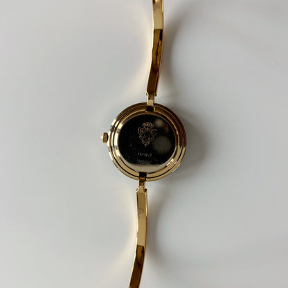 Gucci 1990s Interchangeable Bezel Gold Plated Bangle Watch with 12 bezels, case