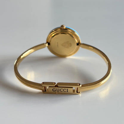 Gucci 1990s Interchangeable Bezel Gold Plated Bangle Watch with 12 bezels, case