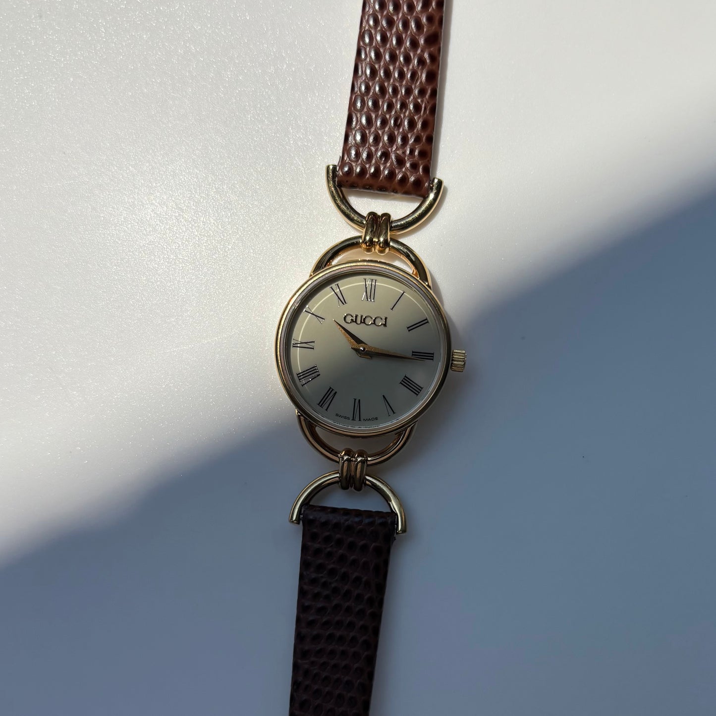 Gucci 1990s Round Cream Dial Horsebit Gold Plated Watch