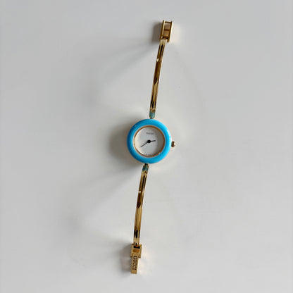 Gucci 1990s Interchangeable Bezel Gold Plated Bangle Watch with 12 bezels, case
