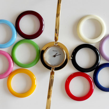Gucci 1990s Interchangeable Bezel Gold Plated Bangle Watch with 12 bezels, case