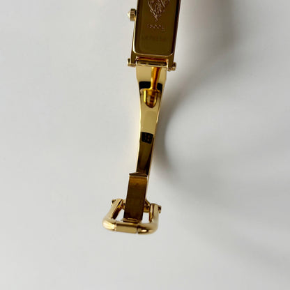 Gucci 1990s Seashell Rectangular Dial Gold Plated Bangle Watch