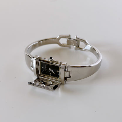 Yves Saint Laurent 1990s Black Dial Silver Bangle Watch